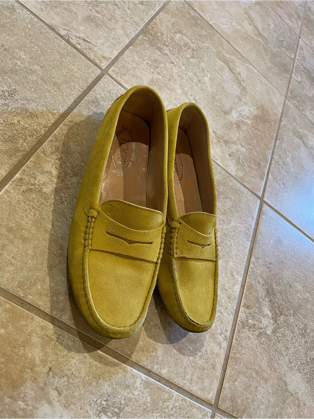 Tod’s Gommino Penny Loafers in Yellow